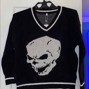 black v-neck skull sweater